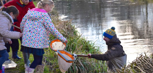 Wessex Chalk Streams and Rivers Trust staff delivering schools river education programme in partnership with Winchester College