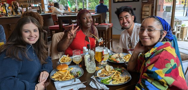 Members of the Involving Young People Collective having a meal during a Blue Spaces site visit.