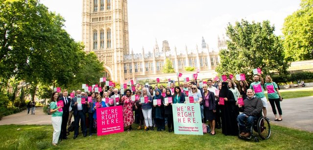 We're Right Here-Group of community champions stand outside the Houses of Parliament holding the 'We're Right Here' manifesto-Group-photo-1-1024x683
