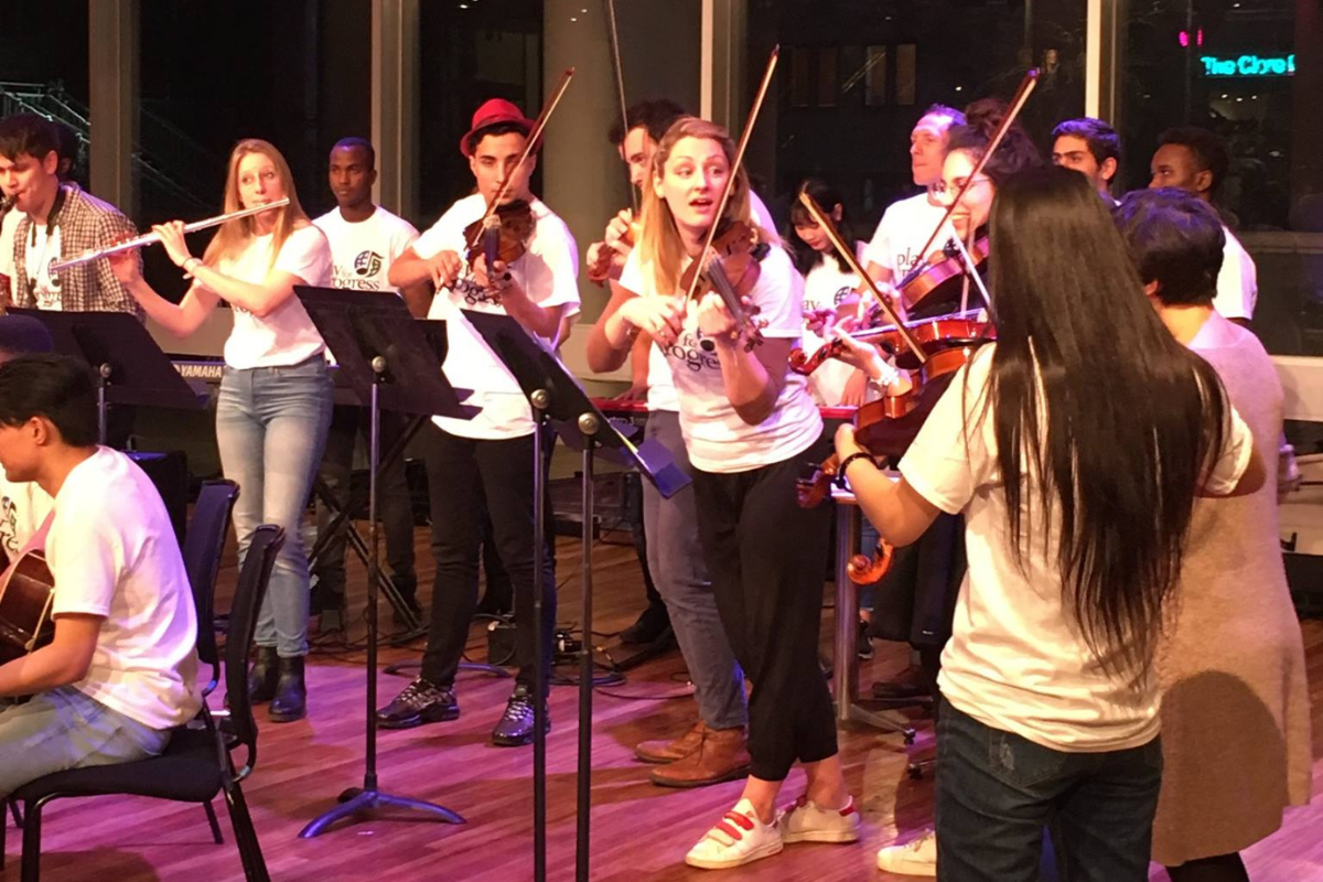 Play for Progress-Young people playing music as part of an orchestra