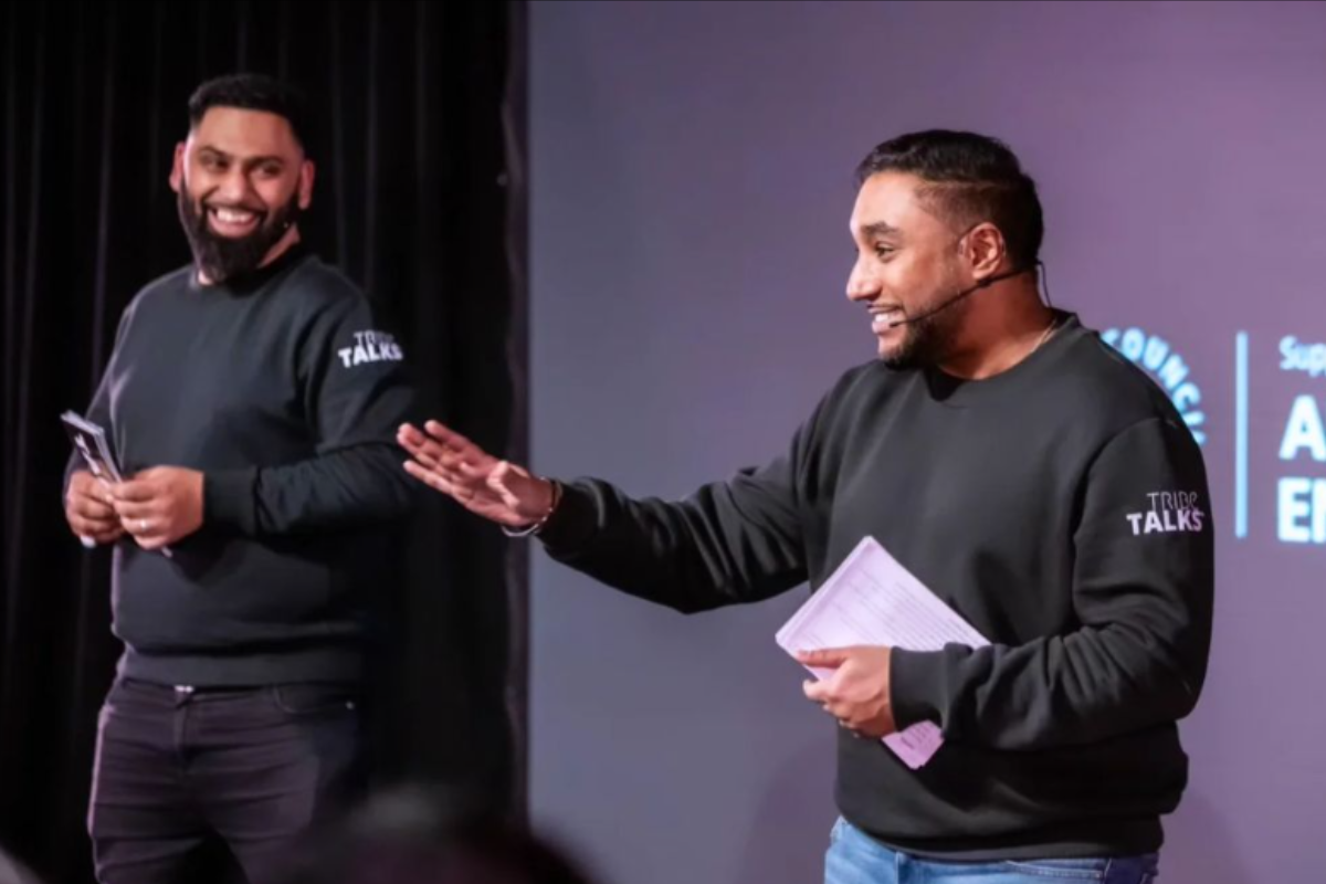Tribe Arts-Two members of the team on stage giving a talk as part of Tribe Talks