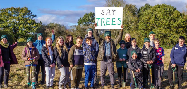 Woodland Trust-Our Funding Manager, Jenny, joins a group of young people to plants some trees at Smithills Estate with Woodland Trust